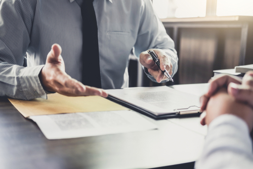 Male lawyer or judge consult having team meeting with client